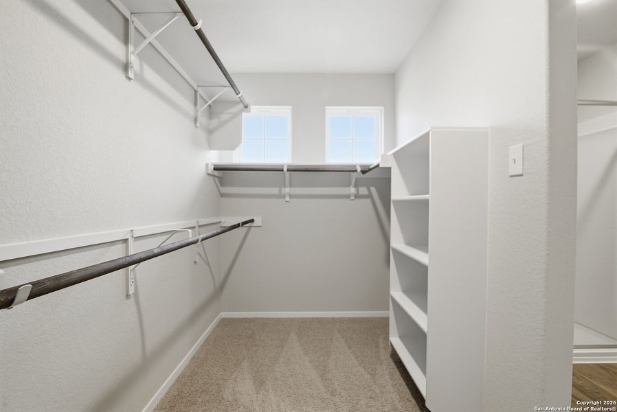 Spacious, unfurnished interior of a new home in Hunters Ranch, San Antonio (Image 18).