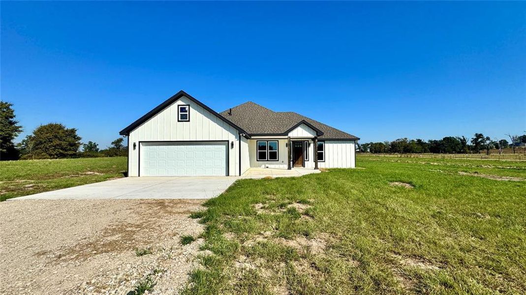 Front exterior of a new home in , Eustace, TX, highlighting curb appeal (Image 2). Front exterior of a new home in , Eustace, TX, highlighting curb appeal (Image 2).
