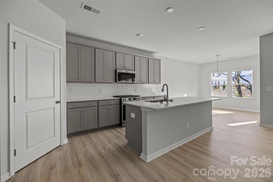 Furnished interior view inside a new home in Cottages at Wingate, Wingate (Image 8). Furnished interior view inside a new home in Cottages at Wingate, Wingate (Image 8).