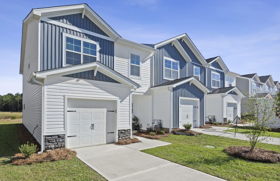 Front exterior of a new home in Knox Place, Hephzibah, SC, highlighting curb appeal (Image 2). Front exterior of a new home in Knox Place, Hephzibah, SC, highlighting curb appeal (Image 2).