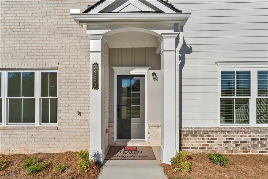 Exterior details and patio area of a home in East Park Village, Kennesaw (Image 3). Exterior details and patio area of a home in East Park Village, Kennesaw (Image 3).
