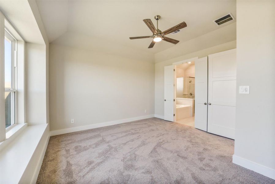 Spacious, unfurnished interior of a new home in Sunterra, Katy (Image 20).