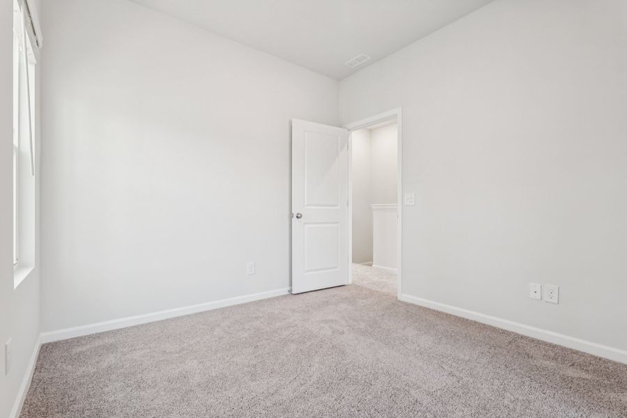 Spacious, unfurnished interior of a new home in Lakeview Village, Charlotte (Image 20). Spacious, unfurnished interior of a new home in Lakeview Village, Charlotte (Image 20).
