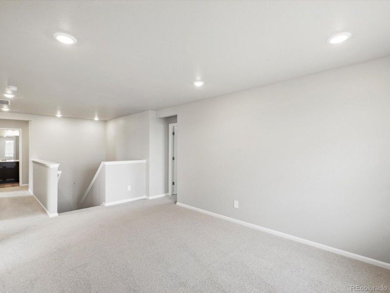 Spacious, unfurnished interior of a new home in Buffalo Highlands: The Canyon Collection, Commerce City (Image 27).