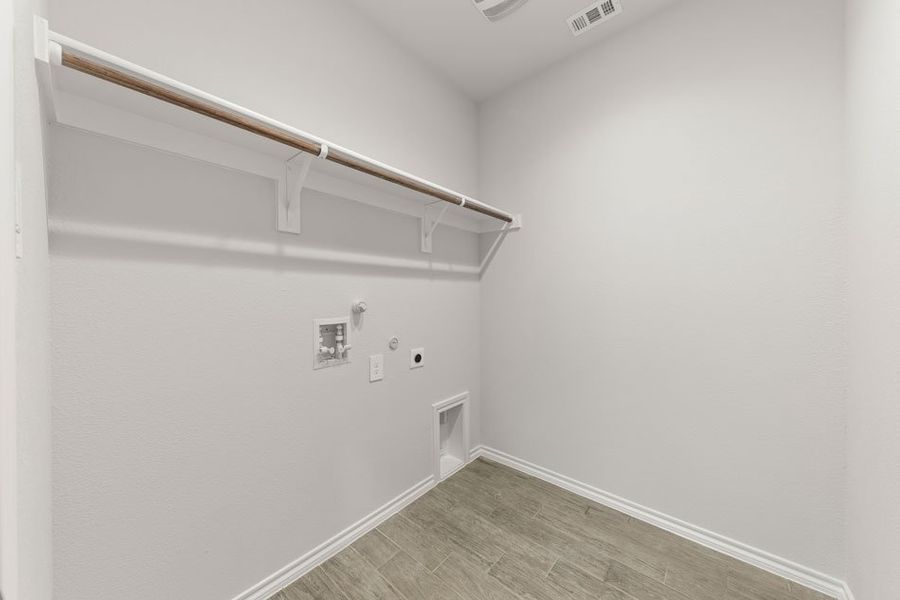 Representative exterior photo of a completed home built from the Maple by Impression Homes in ValleyBrooke, Mesquite, TX (Image 24).