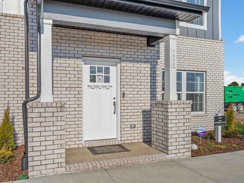 Exterior details and patio area of a home in The Towns at Red River, Gallatin (Image 3). Exterior details and patio area of a home in The Towns at Red River, Gallatin (Image 3).