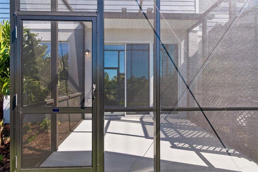 Exterior details and patio area of a home in North River Ranch – Townhomes, Parrish (Image 28).