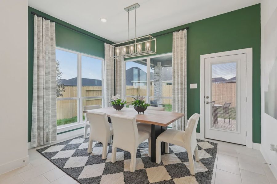 Furnished interior view inside a new home in Sunterra, Katy (Image 8).