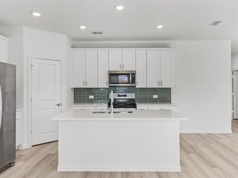 Furnished interior view inside a new home in Simpson Crossing - Spring Series, McKinney (Image 8).
