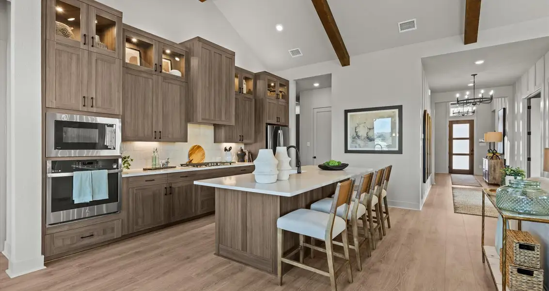 Representative furnished interior of a home built from the Malia by Chesmar Homes in 6 Creeks, Kyle (Image 5).