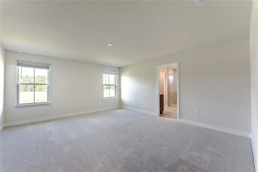 Spacious, unfurnished interior of a new home in The Palms at Venetian Bay, New Smyrna Beach (Image 17). Spacious, unfurnished interior of a new home in The Palms at Venetian Bay, New Smyrna Beach (Image 17).