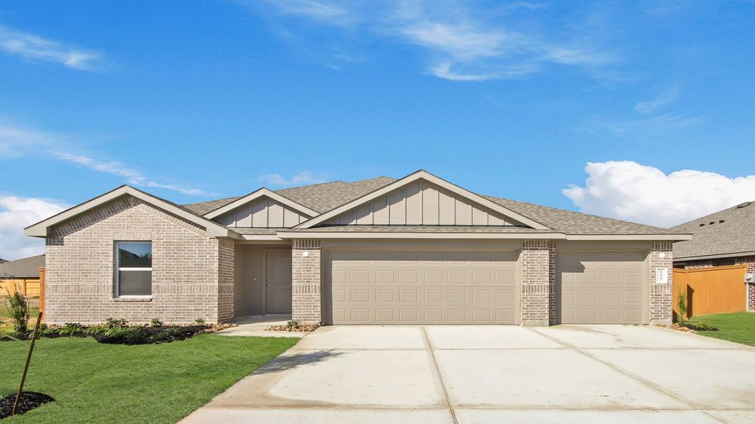 Front exterior of a new home in River Ranch Meadows, Dayton, TX, highlighting curb appeal (Image 1).