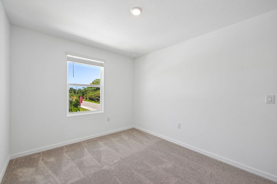 Spacious, unfurnished interior of a new home in The Towns at Tiburon, Nokomis (Image 11).