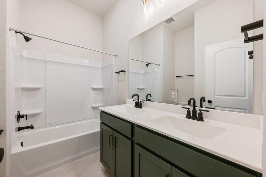 Furnished interior view inside a new home in The Colony 50s, Cedar Creek (Image 3).