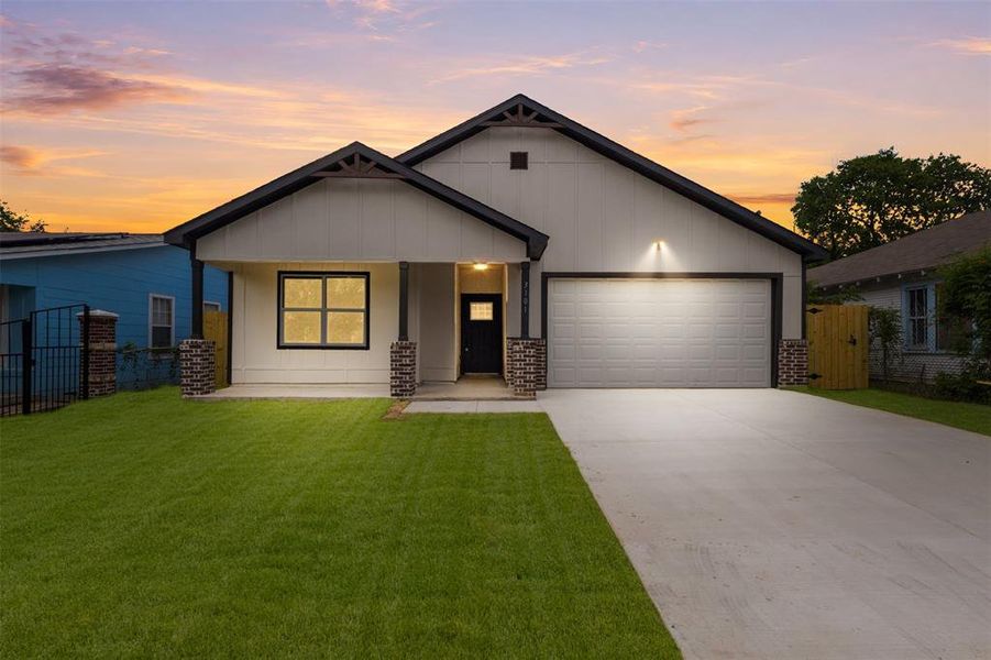 Contemporary exterior featuring vertical siding and a dark trim