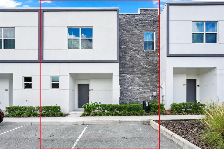 Front exterior of a new home in , Davenport, FL, highlighting curb appeal (Image 1).