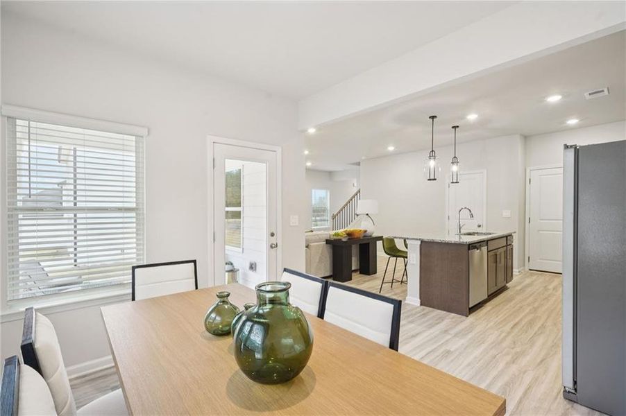 Furnished interior view inside a new home in Avalon - Reserve Series, Conyers (Image 11).