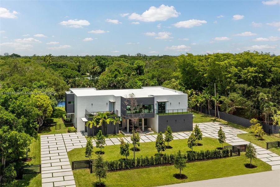 Front exterior of a new home in , Pinecrest, FL, highlighting curb appeal (Image 28).