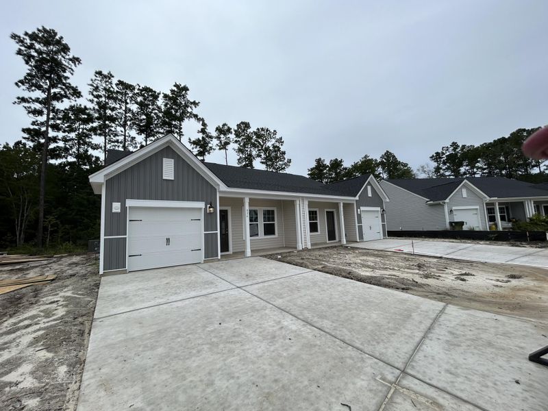 Front exterior of a new home in Hammock Walk at Nexton, Summerville, SC, highlighting curb appeal (Image 20).