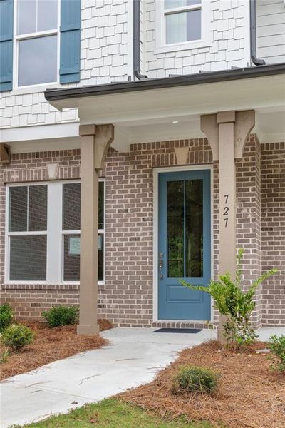Exterior details and patio area of a home in Ashbury Commons, Powder Springs (Image 30).