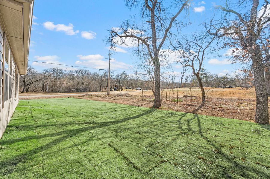 Exterior details and patio area of a home in Runaway Bay, Runaway Bay (Image 4).