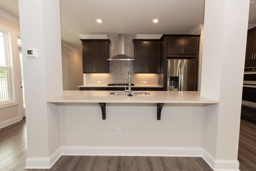 Representative furnished interior of a home built from the The Owens by The Providence Group in Waterhaven, Cumming (Image 8).