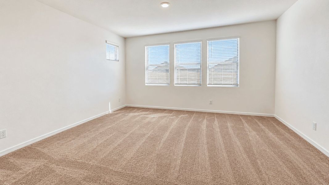 Spacious, unfurnished interior of a new home in The Grove at El Cidro, Goodyear (Image 9).