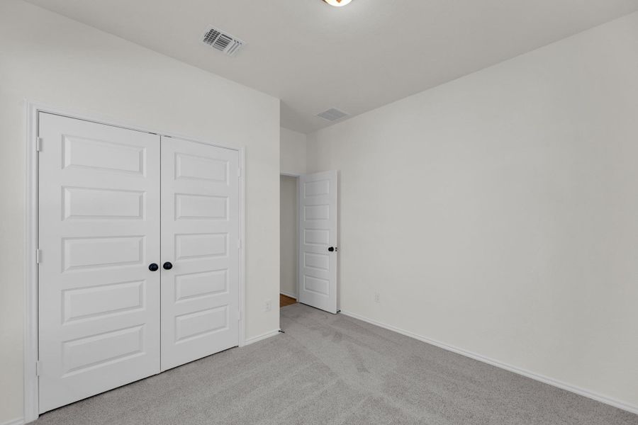 Spacious, unfurnished interior of a new home in Salerno - Classic Collection, Round Rock (Image 24). Spacious, unfurnished interior of a new home in Salerno - Classic Collection, Round Rock (Image 24).