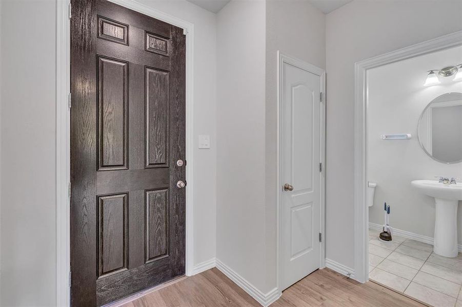 Foyer featuring light hardwood / wood-style floors and sink