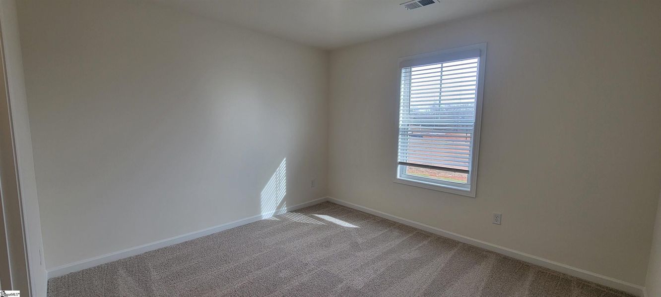 Spacious, unfurnished interior of a new home in Halton Oaks, Spartanburg (Image 32).