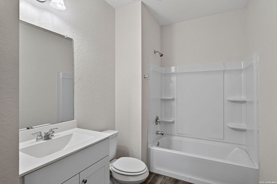 Furnished interior view inside a new home in Hennersby Hollow, San Antonio (Image 7).