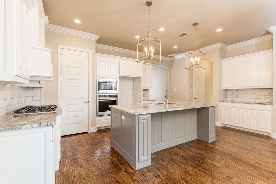 Representative furnished interior of a home built from the The Michie by West Point Homes in Riverdance, Keller (Image 6). Representative furnished interior of a home built from the The Michie by West Point Homes in Riverdance, Keller (Image 6).