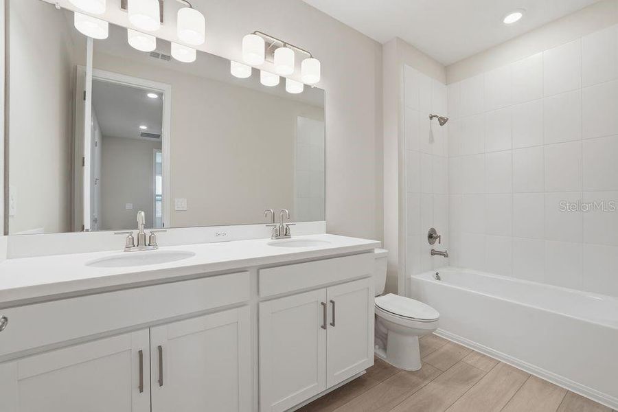Furnished interior view inside a new home in Indigo Creek, Apollo Beach (Image 11).