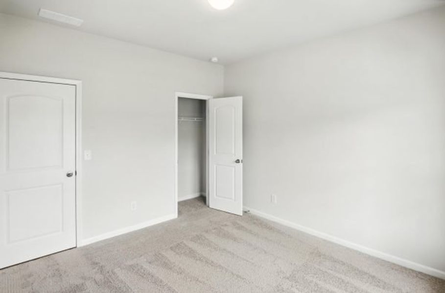 Representative unfurnished interior of a home built from the Orchard by Piedmont Residential in Villages at Cedar Hill, Dallas (Image 54).
