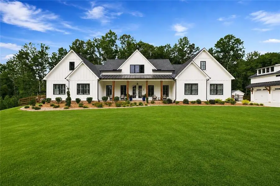 Front exterior of a new home in , Ball Ground, GA, highlighting curb appeal (Image 2). Front exterior of a new home in , Ball Ground, GA, highlighting curb appeal (Image 2).