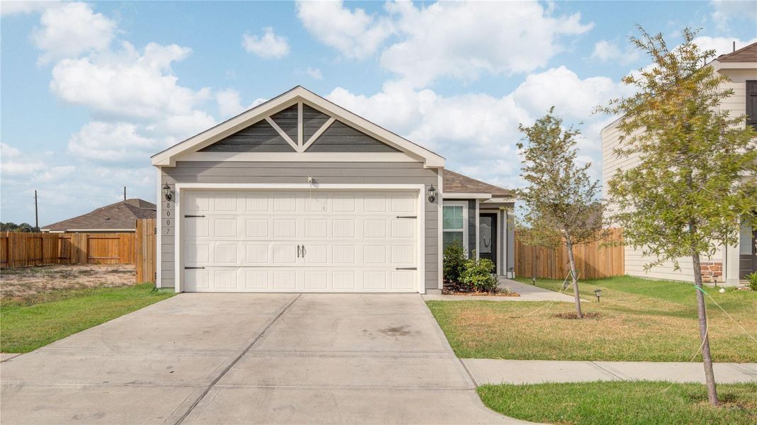 Front exterior of a new home in Wayside Village, Houston, TX, highlighting curb appeal (Image 1).