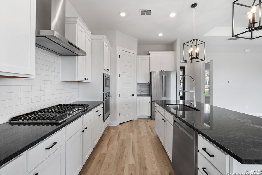 Furnished interior view inside a new home in Potranco West, Castroville (Image 7).
