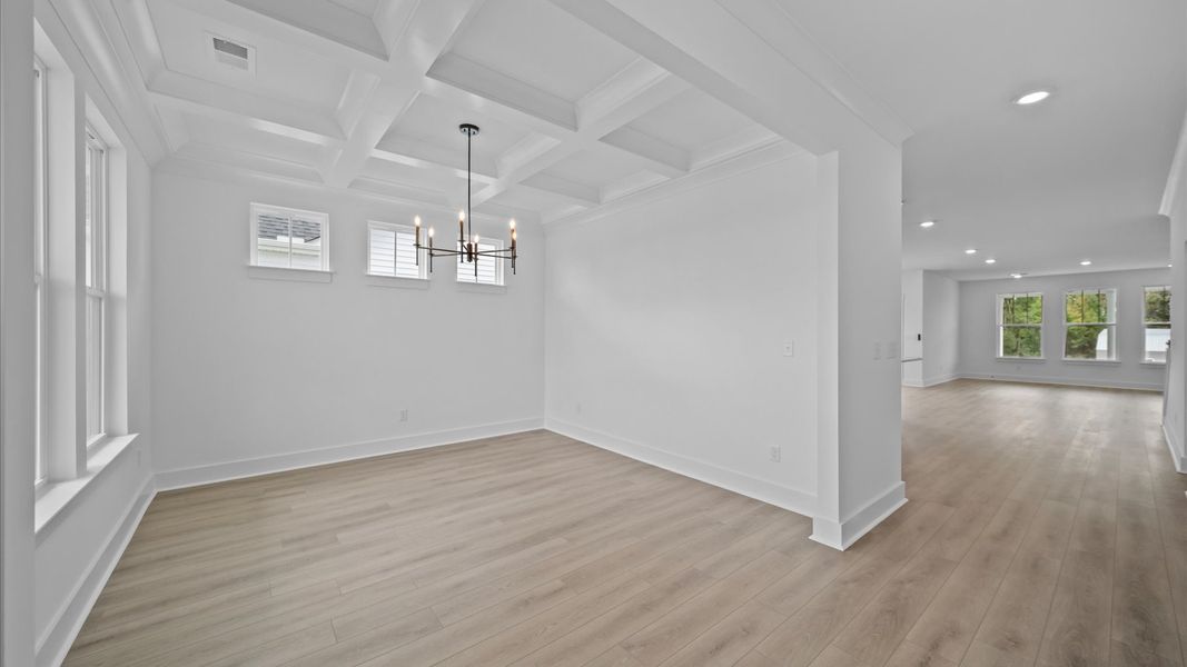 Coffered ceiling detail brings depth and sophistication to this top-notch formal dining room Coffered ceiling detail brings depth and sophistication to this top-notch formal dining room