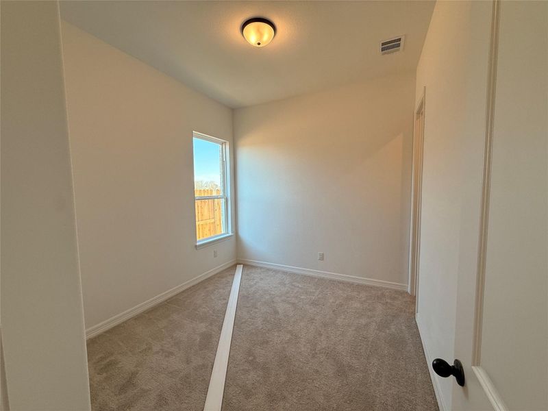 Spacious, unfurnished interior of a new home in Wildrye, Waller (Image 30).