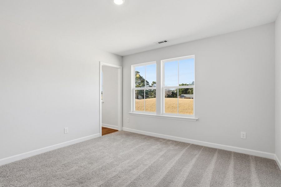 Spacious, unfurnished interior of a new home in Renaissance at White Oak, Garner (Image 32).
