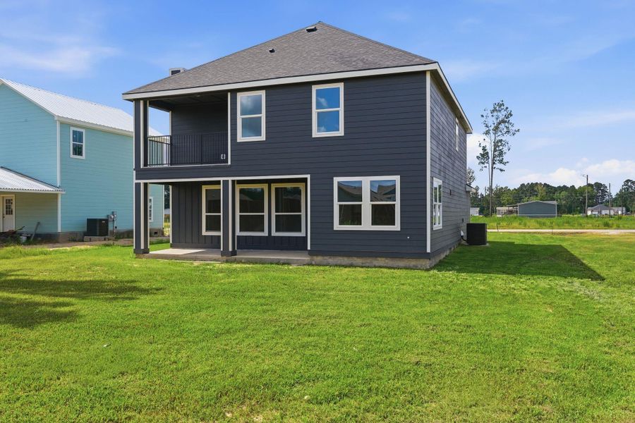 Exterior details and patio area of a home in , Conroe (Image 24).