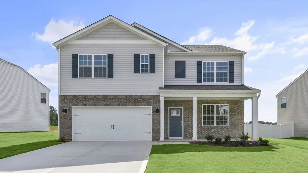 Front exterior of a new home in North Gate, Vass, NC, highlighting curb appeal (Image 1). Front exterior of a new home in North Gate, Vass, NC, highlighting curb appeal (Image 1).
