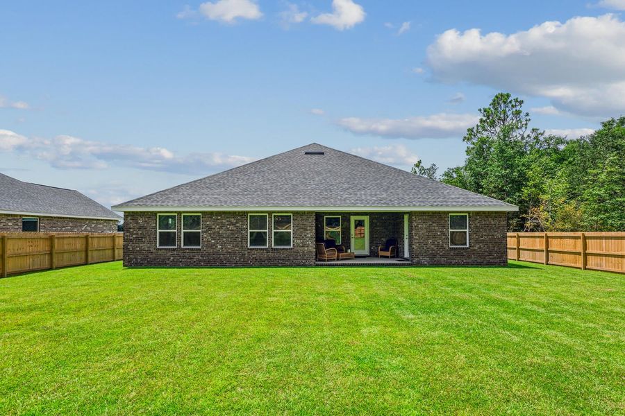 Representative exterior photo of a completed home built from the The Turquoise by Herbst Homes in Clear Water Landing, Milton, FL (Image 31).