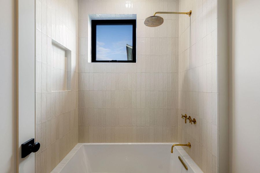Bathroom featuring shower / bathtub combination