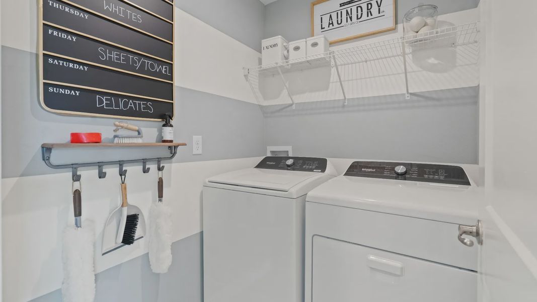 Bedroom level laundry room in a DRB Homes Ambersweet model at the Trinity Place community. Bedroom level laundry room in a DRB Homes Ambersweet model at the Trinity Place community.