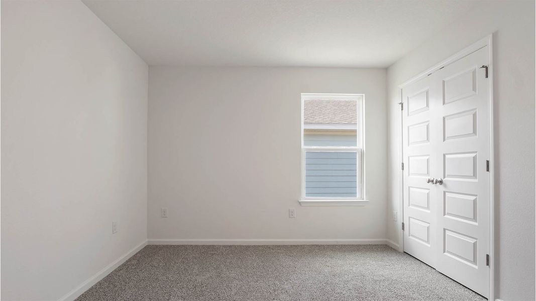 Spacious, unfurnished interior of a new home in Ashton Park Phase III, Freeport (Image 15).