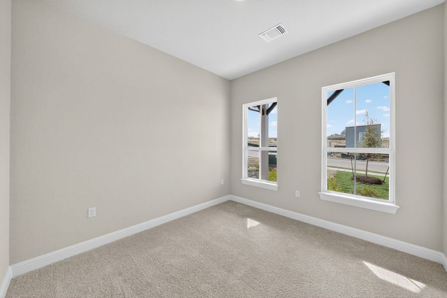 Spacious, unfurnished interior of a new home in Whisper Valley, Manor (Image 28).