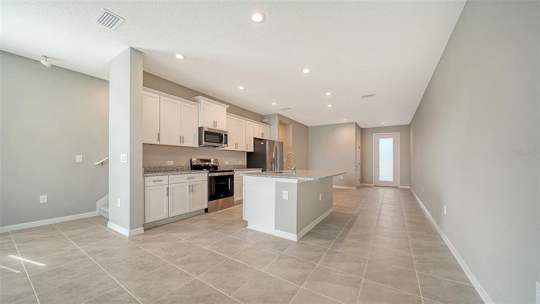 Furnished interior view inside a new home in , Sarasota (Image 7).