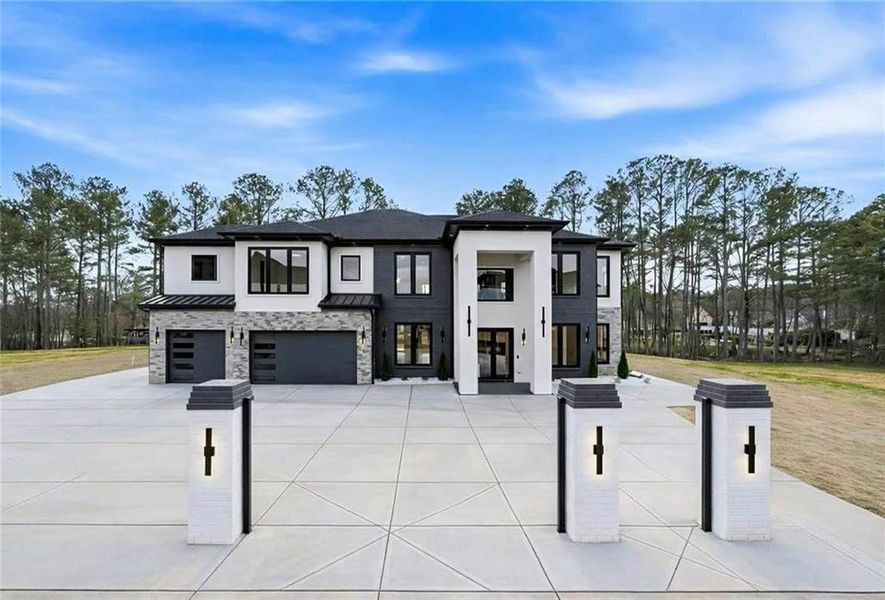 Front exterior of a new home in , Buford, GA, highlighting curb appeal (Image 32).