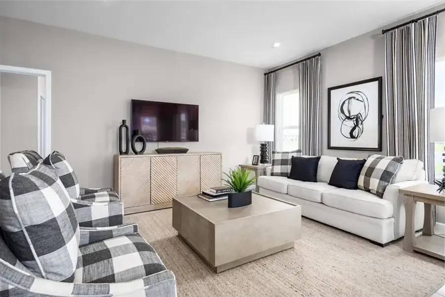 Representative furnished interior of a home built from the Adeline by Ryan Homes in Seminole Palms, Palm Coast (Image 9).